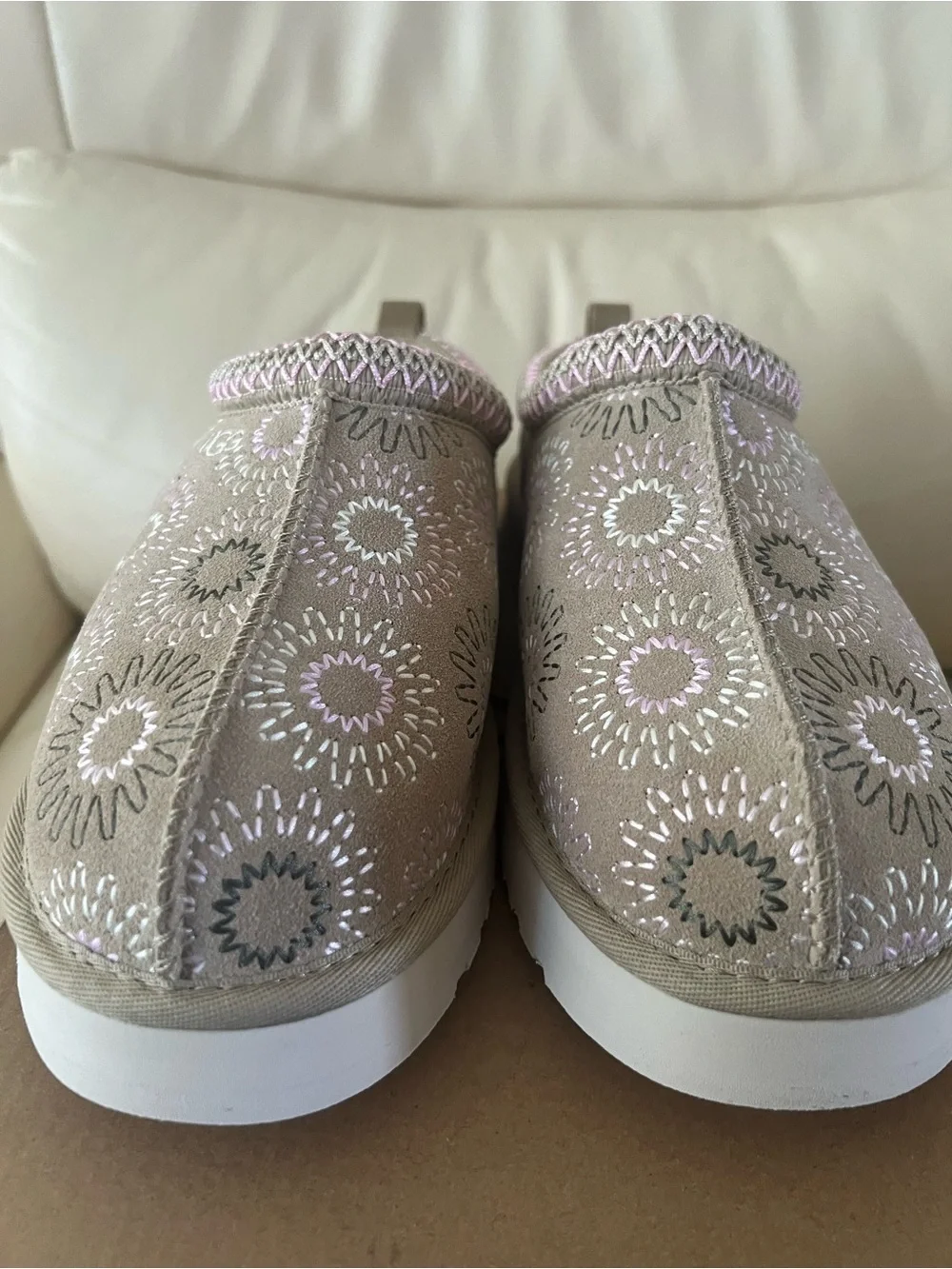 UGG Taupe Slip-On Clogs with Pink & White Embroidered Motifs